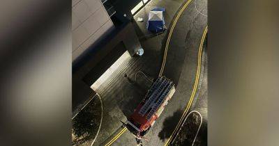 Man dies outside apartment block as forensic tent put in place - manchestereveningnews.co.uk