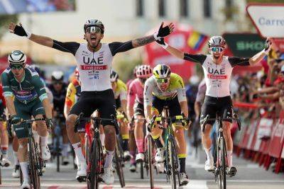 UAE Team Emirates rider Juan Sebastian Molano sprints to Stage 12 win at Vuelta a Espana
