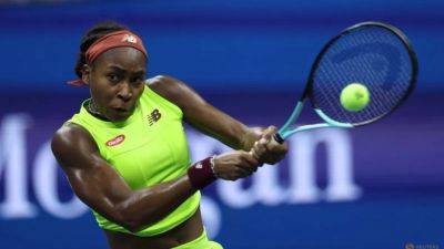 Gauff beats Muchova to reach US Open final after protesters disrupt match