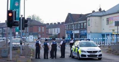 Huge police cordon after three teenagers stabbed following 'gang fight' - manchestereveningnews.co.uk - state Indiana - county Lane