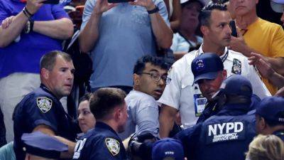 US Open beefs up security after protesters stop match