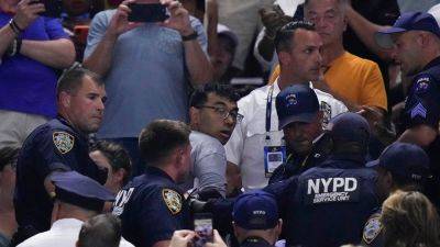 Karolina Muchova - Sarah Stier - US Open protester who glued his feet to floor says NYPD took him to psych ward after his arrest - foxnews.com - Usa - India - county Arthur - county Ashe - county Queens - county York