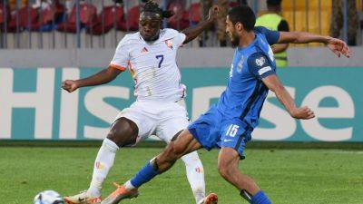 Carrasco strike in Baku lifts Belgium top of Euro qualifying group