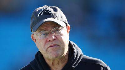 Panthers owner David Tepper appears to throw drink at Jaguars fan from suite
