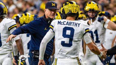 College Football Playoff - How J.J. McCarthy meshed with Jim Harbaugh to become Michigan's best QB - ESPN