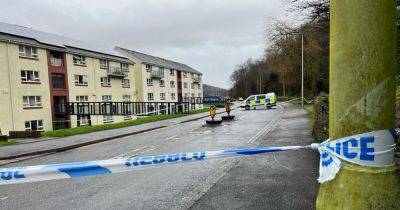Police cordon off road and specialist investigators at scene as man, 30, dies - walesonline.co.uk