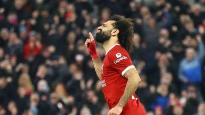 Salah scores twice as league-leading Liverpool beat Newcastle 4-2