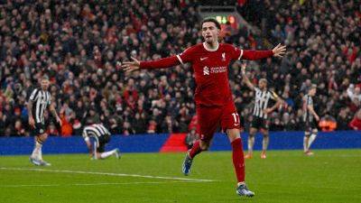 Liverpool burn off Newcastle to go three clear in title race