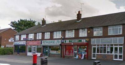 Terrified staff left 'shaken' after knifepoint robbery at newsagents by suspect wearing high-vis