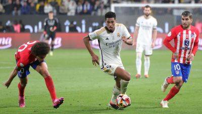 Real Madrid edge Atletico 5-3 to reach Super Cup final