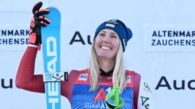 Huetter wins super-G to give Austrian women 1st victory of World Cup season