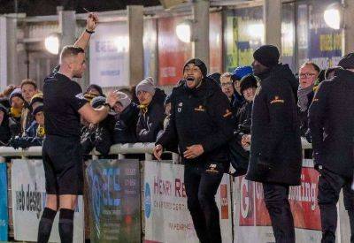 Maidstone United manager George Elokobi one booking away from a two-match touchline ban with FA Cup fourth-round tie at Ipswich looming | Harsh caution against Dartford leaves boss treading carefully