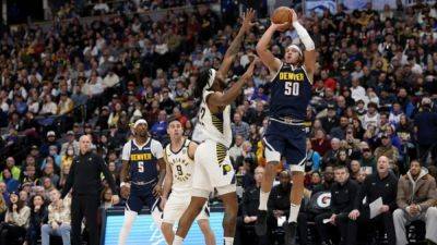Lillard buzzer-beater lifts Bucks over Kings, Nuggets cool off Pacers