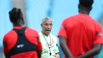 Chris Hughton accosted by angry Ghana fan after AFCON defeat