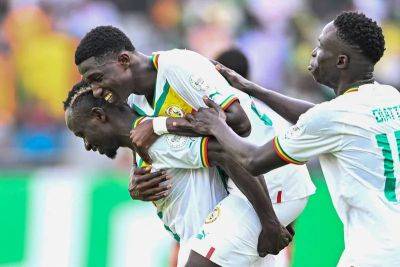 Afcon 2023: Lamine Camara hits brace as Senegal get title defence off to winning start - thenationalnews.com - Cameroon - Senegal - Gambia