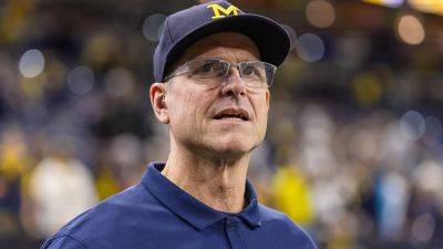 Michigan's Jim Harbaugh wants firing protection clause in contract amid NCAA probes, NFL flirtation: report