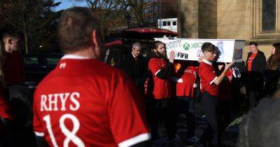 Wearing red, they said a final farewell to a brave teenager who fought until the very end