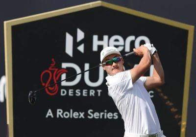 Rory Macilroy - Adrian Meronk - Dubai Desert Classic: Li Haotong hints at revival after taking lead in opening round - thenationalnews.com - China