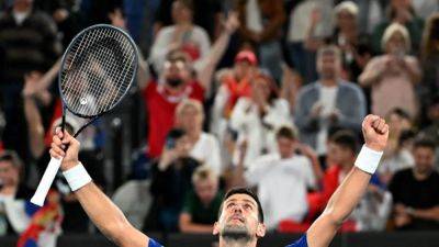 Djokovic finds his groove to down Etcheverry in Melbourne