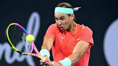 Rafael Nadal marks return with dominant win over Dominic Thiem at the Brisbane International