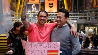 Jubilant Spanish football fan returns home after being freed by Iran