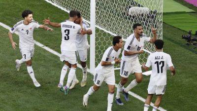 Wataru Endo - Iraq stun Japan to seal Asian Cup last-16 spot - channelnewsasia.com - Qatar - Japan - Iraq