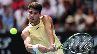 Carlos Alcaraz into round four at Australian Open as Shang Juncheng retires injured