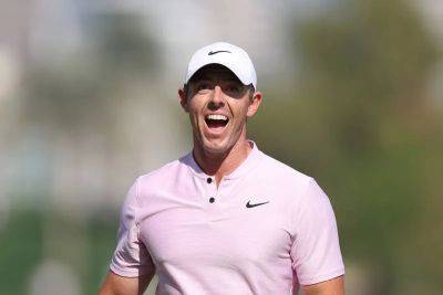 Rory Macilroy - Cameron Young - Rory McIlroy reignites Dubai Desert Classic title defence with stunning 63 at the Majlis - thenationalnews.com