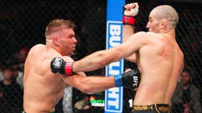 Dricus Du Plessis dethrones Sean Strickland in UFC 297 main event - ESPN