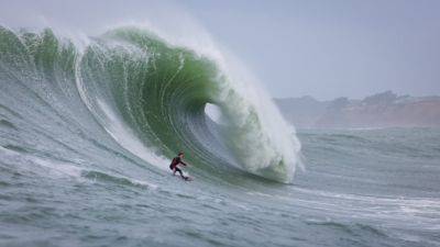 Big wave surfers take on huge swells at Mavericks in Northern California