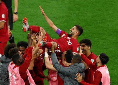 Asian Cup: 'Spectacular' Qatar end group stage with third win after Al Haydos wondergoal - thenationalnews.com - Qatar - China - Lebanon - Tajikistan