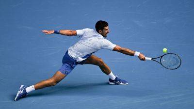 Novak Djokovic sees off tough Taylor Fritz to reach semi-finals at Australian Open