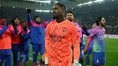 Mike Maignan - Supporters who racially abused AC Milan goalkeeper Mike Maignan given five-year stadium bans - rte.ie - Italy