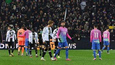 Police punish 4 more Udinese soccer fans for racially abusing AC Milan goalkeeper