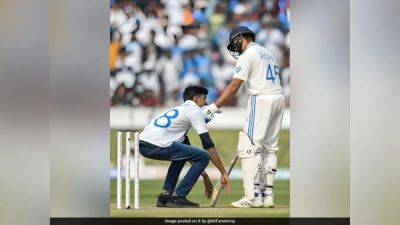 Zak Crawley - Jonny Bairstow - Virat Kohli - Rohit Sharma - Jack Leach - Fan Invades Pitch Wearing Virat Kohli's Shirt, Touches Rohit Sharma's Feet During India vs England First Test - sports.ndtv.com - Britain - India