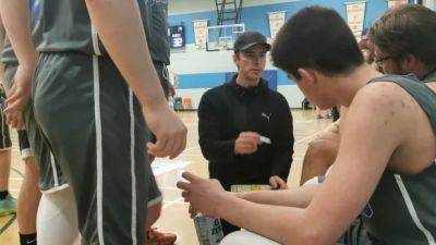 Burlington basketball players rally for coach after he suffers a brain injury