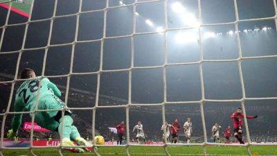 Milan pay the penalty in draw with Bologna