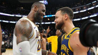 Lakers' LeBron James, Warriors' Stephen Curry add to classic rivalry in 2-OT duel - ESPN