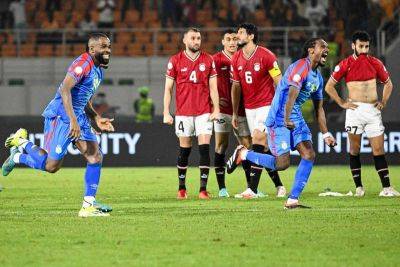Arthur Masuaku - Egypt slump out of Afcon 2023 with shootout defeat to DR Congo as Nigeria flex muscles - thenationalnews.com - Egypt - Cameroon - Senegal - Ghana - Guinea - Ivory Coast - Nigeria - Congo
