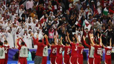 Holders Qatar knock Palestine out of Asian Cup to secure last-eight spot - channelnewsasia.com - Qatar - Uzbekistan - Thailand - Palestine