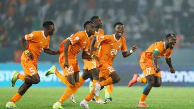 Franck Kessie - Sebastien Haller - Ivory Coast send defending champions Senegal out of Cup of Nations - channelnewsasia.com - Senegal - Burkina Faso - Mali - Ivory Coast - Equatorial Guinea