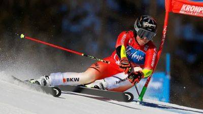 Gut-Behrami wins women's giant slalom, trims injured Shiffrin's overall World Cup lead