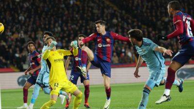 Roque fires Barca to narrow win over Osasuna