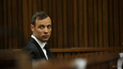 'Blade Runner' Pistorius released on parole 11 years after murdering girlfriend - channelnewsasia.com - South Africa - county Day