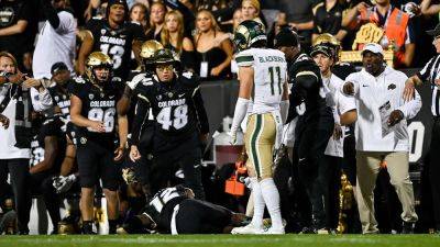 Five people charged for threatening Colorado State player who sent Travis Hunter to hospital after late hit