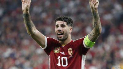 Injured Liverpool midfielder Szoboszlai to miss key cup clashes