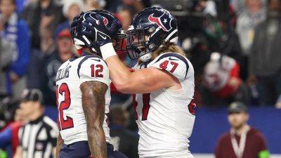 Texans clinch playoff spot by holding off Colts' late push; Indianapolis eliminated