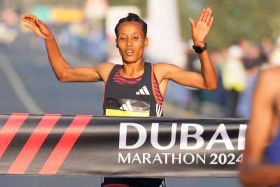 Tigist Ketema wins Dubai Marathon on debut and shatters course record - thenationalnews.com - Ethiopia - county Marathon
