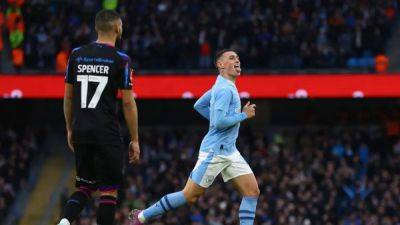 Foden double fires Man City to 5-0 FA Cup win over Huddersfield