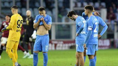 Ten-man Napoli succumb to Torino's charge in 3-0 rampage